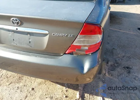 2003 Toyota Camry Le z USA, uszkodzony, nr VIN 4T1BE30K13U725595